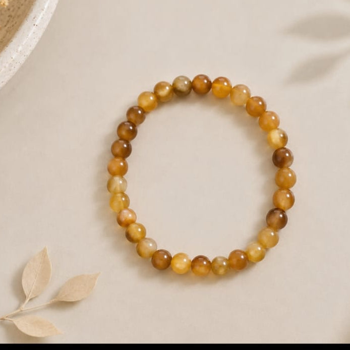 Pulsera de ojo de tigre dorado